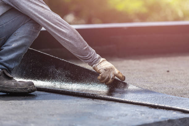 Professional Waterproofing technician working in Versailles, PA